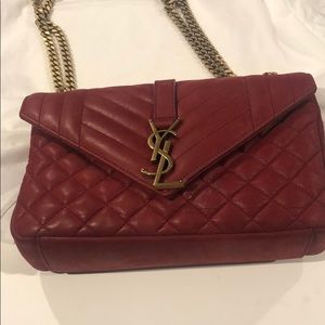 Authentic ysl handbag in burgundy/red